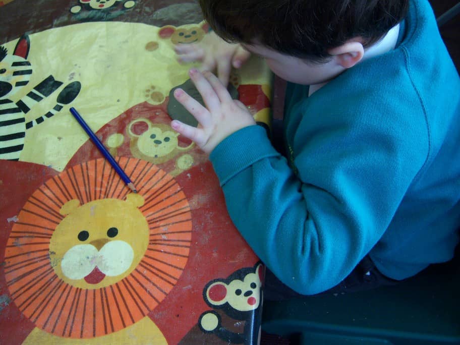 Engrossed in an art activity – Riverbank School